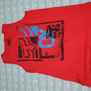 A large Fox brand muscle shirt, red in color